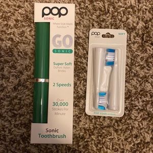 Pop sonic toothbrush with replacement heads